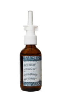 Zijkant van het flesje Wild Mamas Wild Relief met etiket